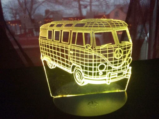 Yellow Pink 3D VW Bus LED Lamp glowing with color-changing lights.