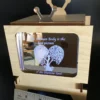 Close-up of interchangeable acrylic insert with ‘The Human Body is the best picture of the Human Soul’ quote