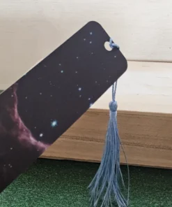 Cosmic galaxy design bookmark with blue tassel