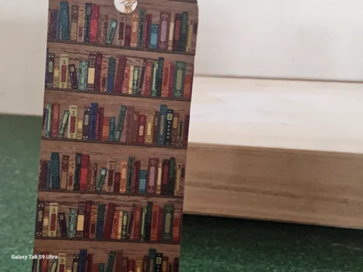 Vintage-style bookshelf design bookmark with black tassel