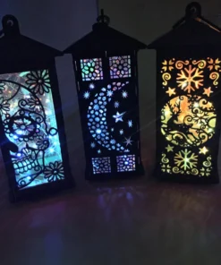 A close-up of handcrafted wooden lanterns showcasing intricate cutouts before illumination.
