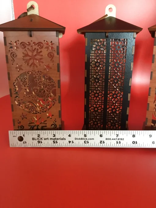 arge sugar skull wooden lantern with LED lights, shown next to a 12-inch ruler for scale. 01